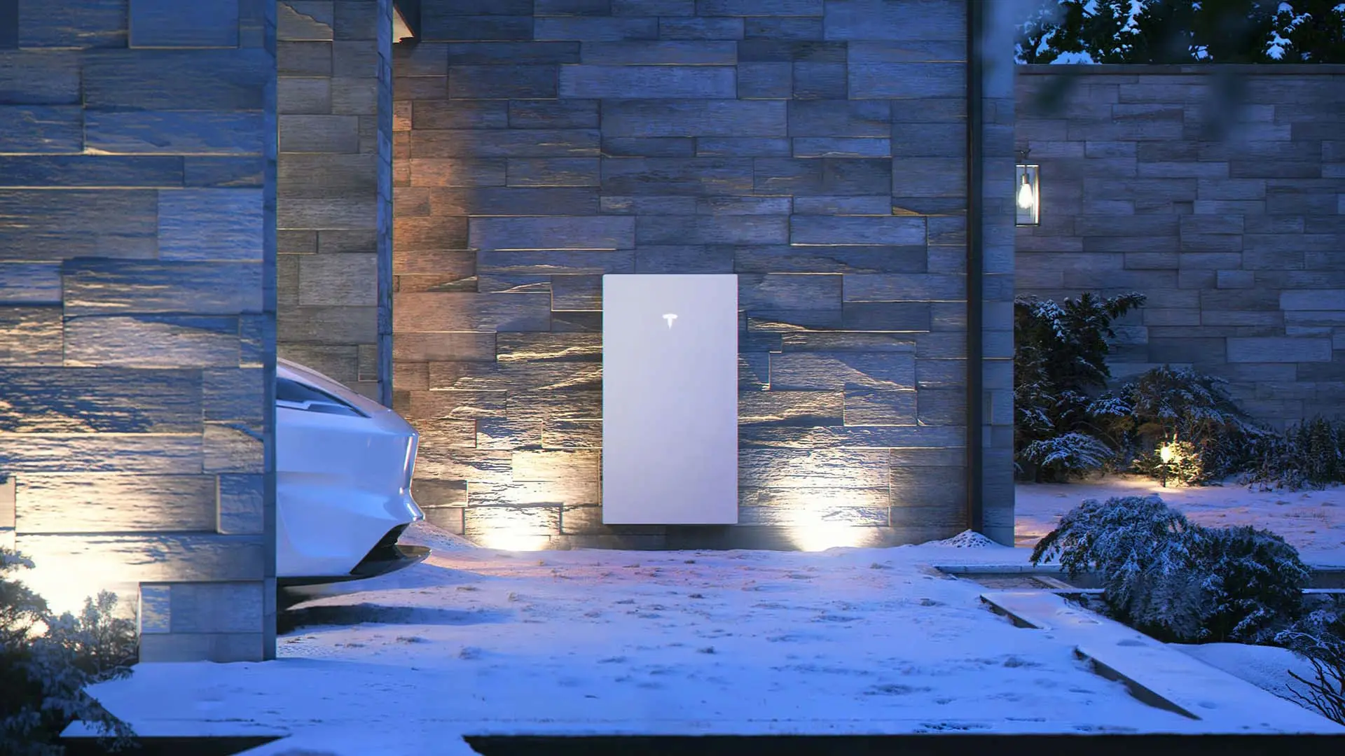 Tesla Powerwall on an exterior wall during winter